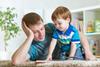 Dad reading with child